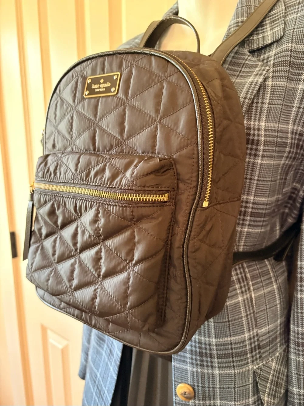 kate spade Black Quilted Med. Backpack, great condition